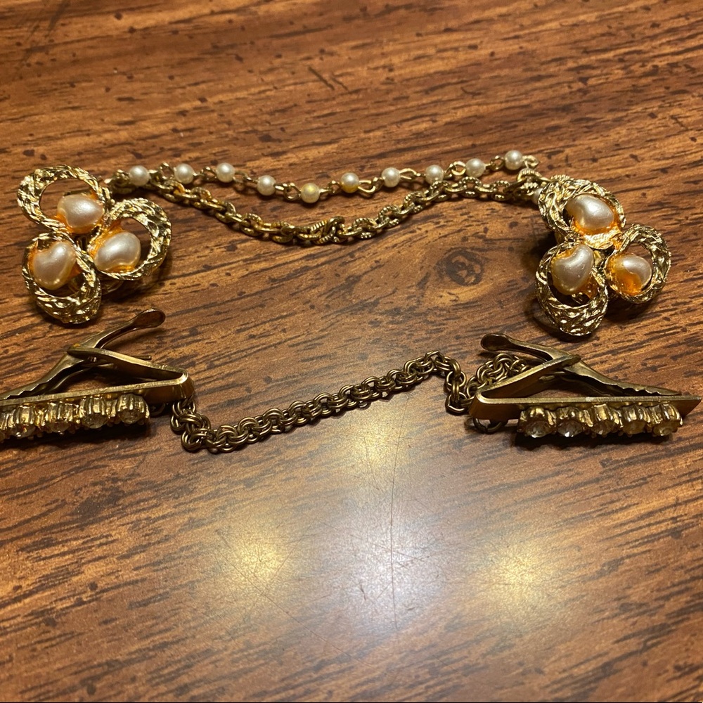 3 cardigan holders